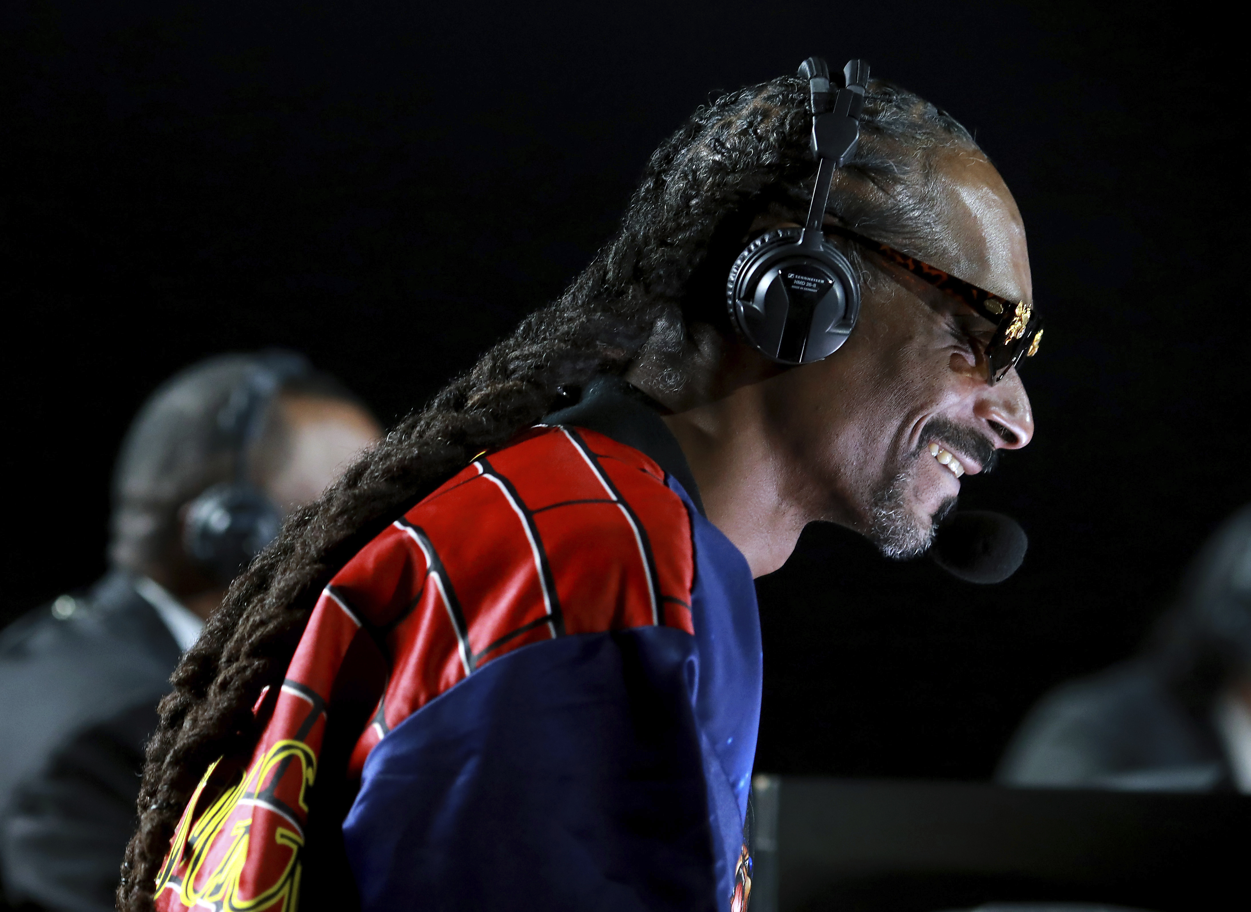 Snoop Dogg performs onstage at an exhibition boxing bout between Mike Tyson and Roy Jones Jr. on Nov. 28, 2020, in Los Angeles. The bout was unofficially ruled a draw by the WBC judges at ringside.