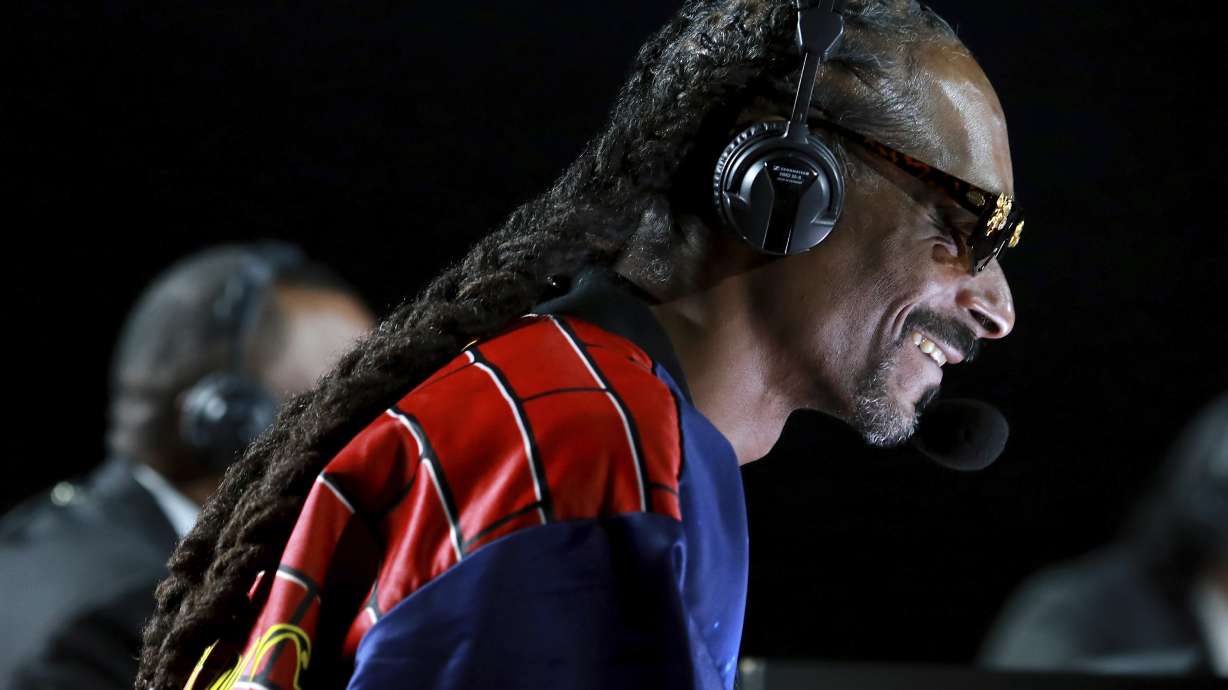 Snoop Dogg performs onstage at an exhibition boxing bout between Mike Tyson and Roy Jones Jr. on Nov. 28, 2020, in Los Angeles. The bout was unofficially ruled a draw by the WBC judges at ringside.