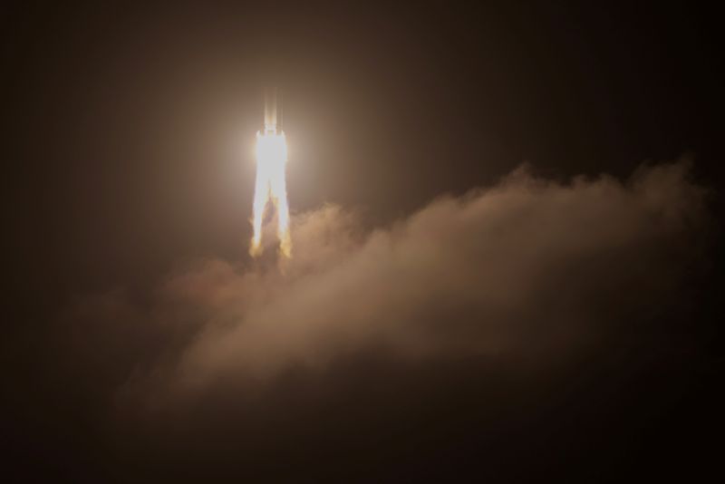 FILE PHOTO: The Long March-5 Y5 rocket, carrying the Chang'e-5 lunar probe, takes off from Wenchang Space Launch Center, in Wenchang, Hainan province, China November 24, 2020. China Daily via REUTERS