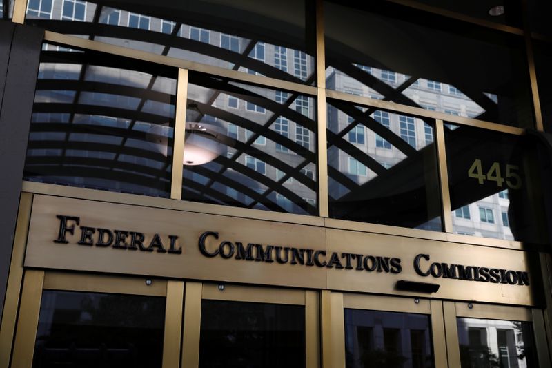FILE PHOTO: Signage is seen at the headquarters of the Federal Communications Commission in Washington, D.C., U.S., August 29, 2020. REUTERS/Andrew Kelly