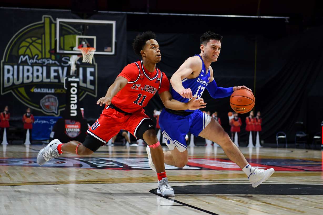 BYU guard Alex Barcello drives against St. John's in the Roman Legends Classic, Wednesday, Dec. 2, 2020 in Uncasville, Connecticut.