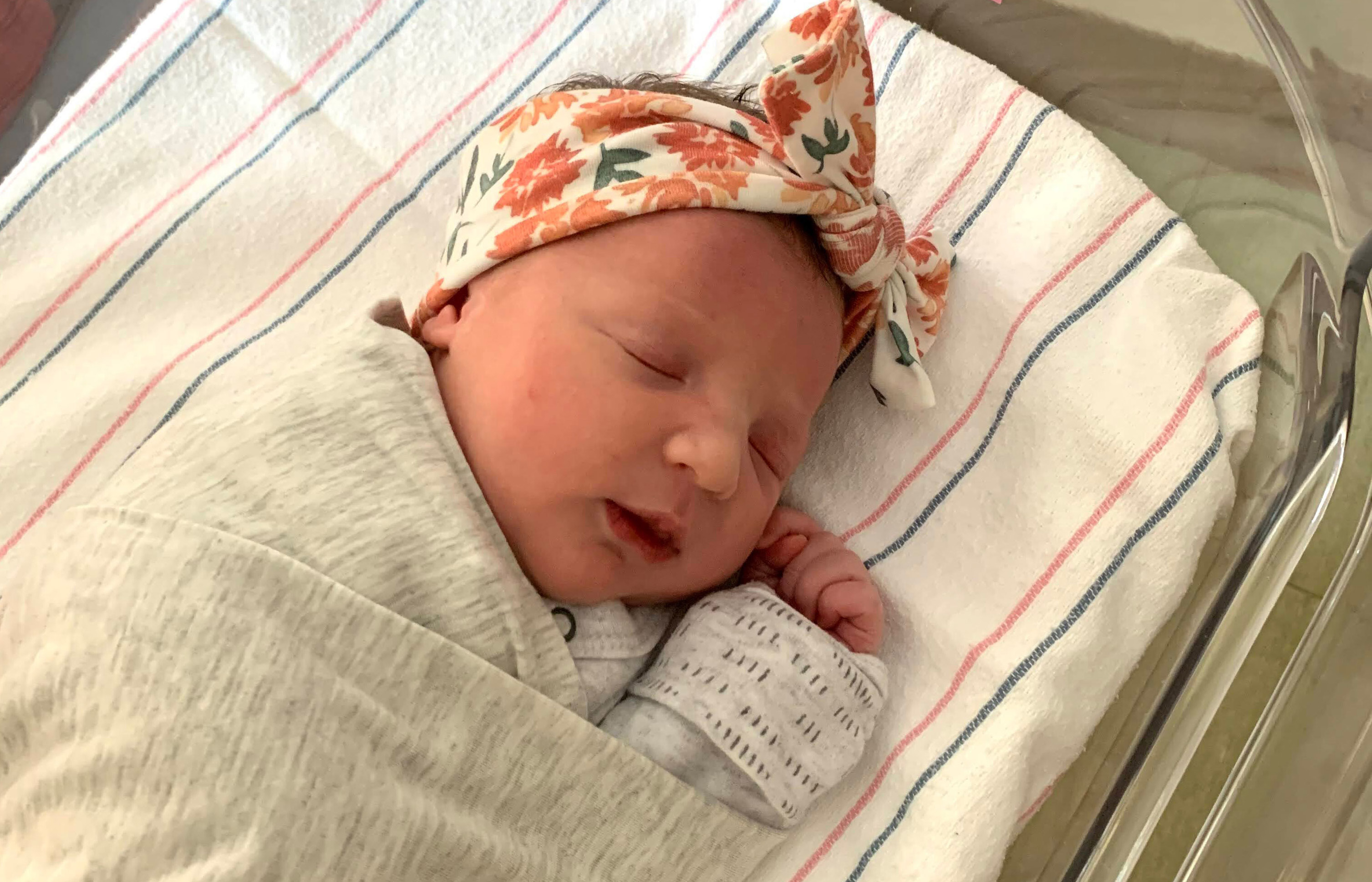 Molly Everette Gibson, seen adorably sleeping, has set what's thought to be a record. The embryo from which she was born was frozen for 27 years.