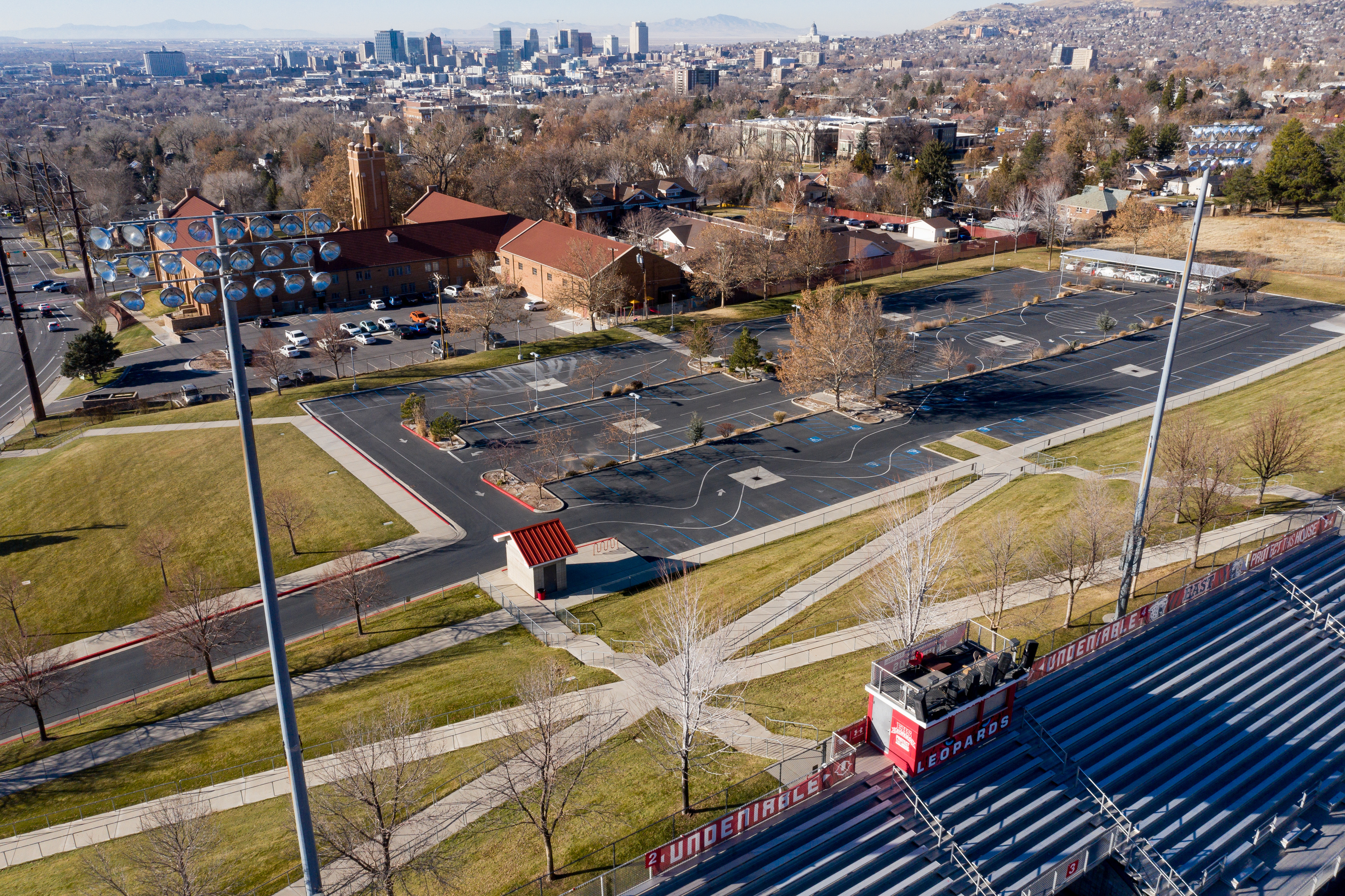 A parking lot next to East High School's football field in Salt Lake City is pictured on Thursday, Dec. 3, 2020. New Wi-Fi antennas at the football field and the school's student parking lot allow for students who may not have internet connectivity at home to park nearby and connect so they can fulfill remote-learning tasks.