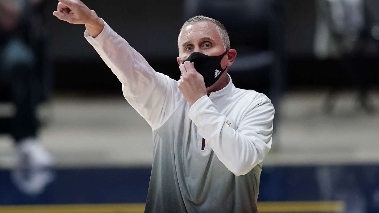 Arizona State coach Bobby Hurley gestures to players during the first half of the team's NCAA college basketball game against California in Berkeley, Calif., Thursday, Dec. 3, 2020.