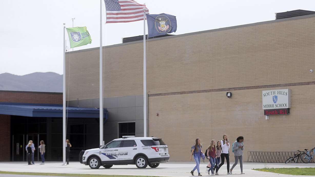 Students leave South Hills Middle School at the end of the day, after a man attacked a school resource officer and injured him with a piece of wood in Riverton on Monday, April 29, 2019.
