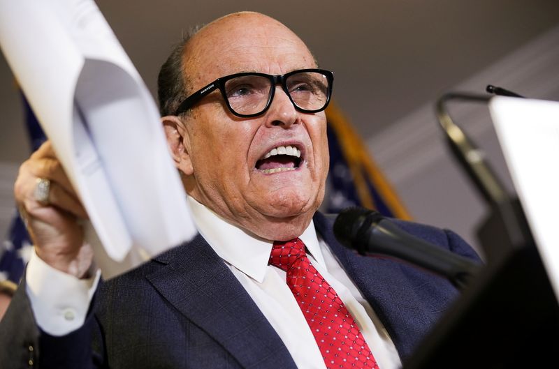FILE PHOTO: Former New York City Mayor Rudy Giuliani, personal attorney to U.S. President Donald Trump, speaks about the 2020 U.S. presidential election results during a news conference in Washington, U.S., November 19, 2020. REUTERS/Jonathan Ernst