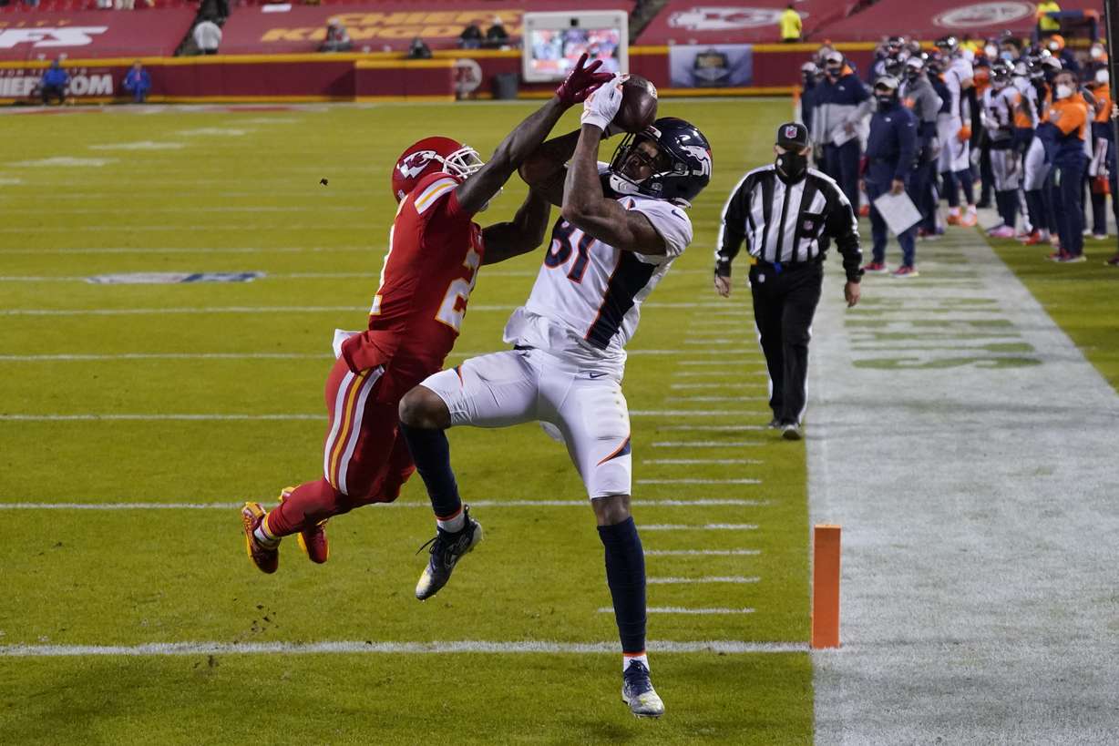 Denver Broncos wide receiver Tim Patrick (81) catches a 10-yard touchdown pass as Kansas City Chiefs cornerback Bashaud Breeland (21) defends in the second half of an NFL football game in Kansas City, Mo., Sunday, Dec. 6, 2020.