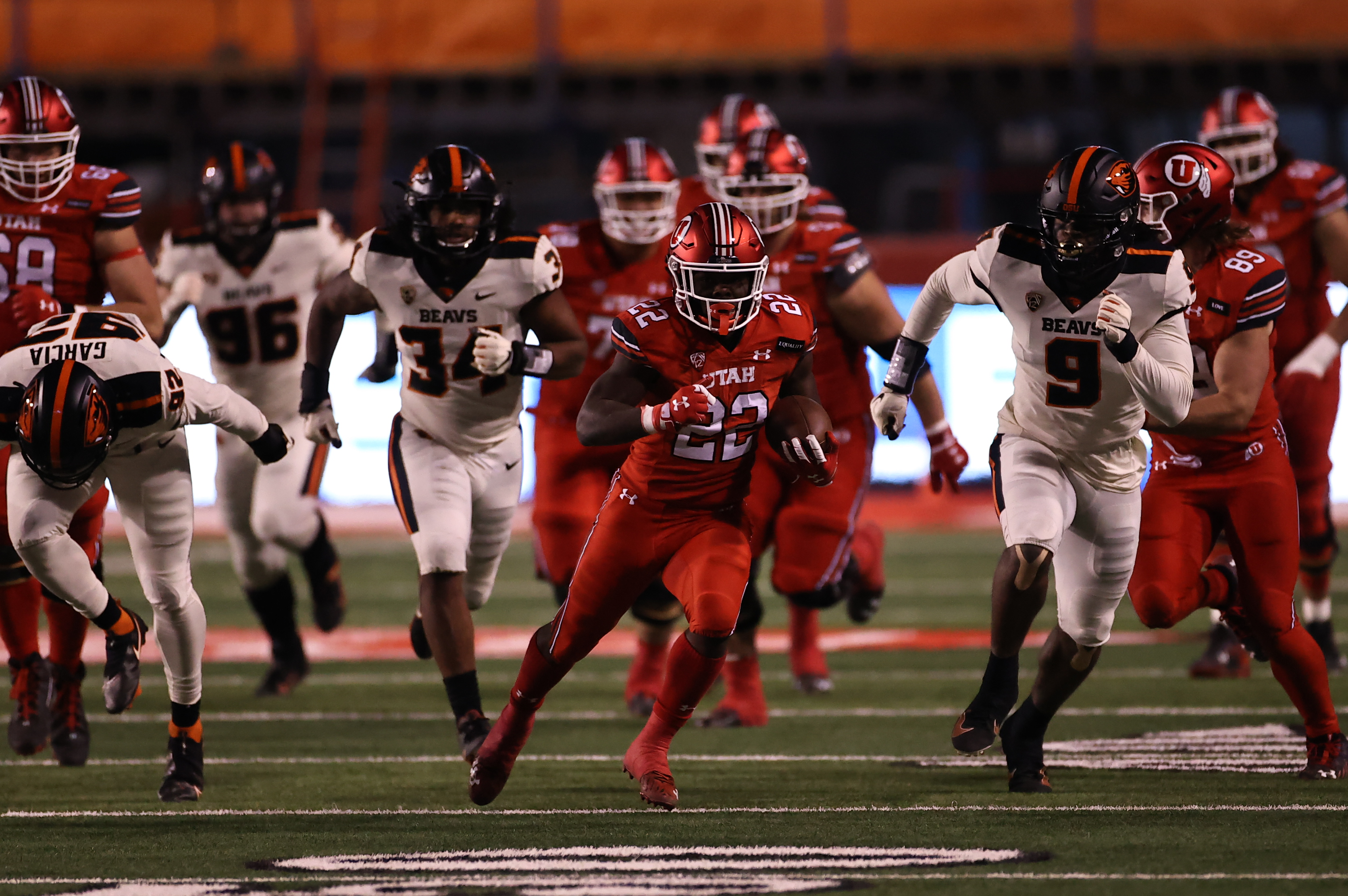 Freshman running back Ty Jordan breaks free for a big run against Oregon State at Rice-Eccles Stadium on Dec. 5, 2020.
