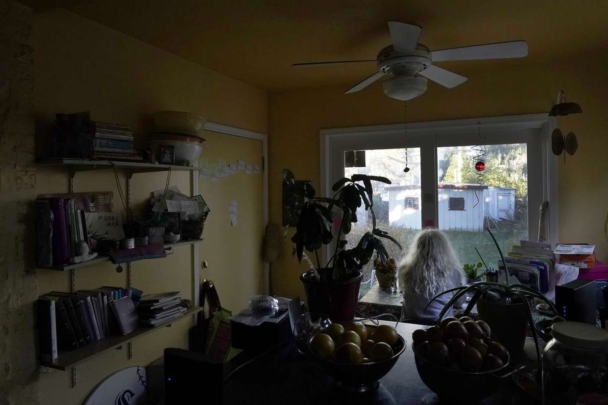 Phyllis Marder participates in a virtual Tohar study of the Torah at her home in Evanston, Ill., on Wednesday, Nov. 11, 2020. At first, Marder, 66, didn’t tell anyone about going to food pantries.