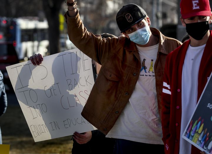 Salt Lake City School District students of all ages rally in favor of attending school in person outside of East High School in Salt Lake City on Monday, Dec. 7, 2020.