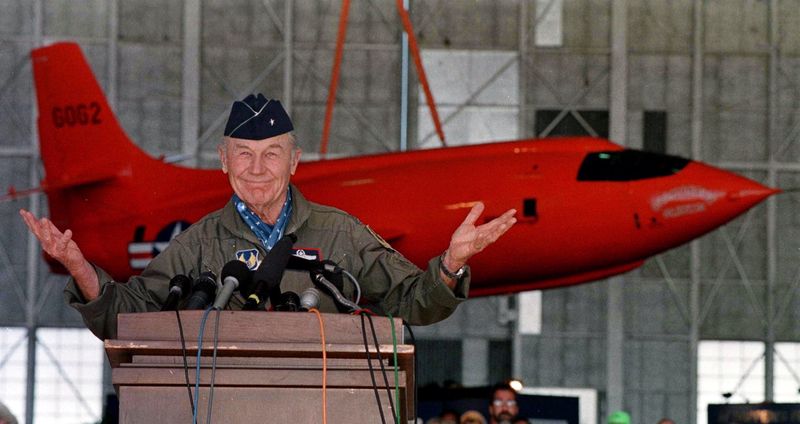 FILE PHOTO: Retired Air Force General Chuck Yeager answers questions from the media, during a press conference honoring the 50th anniversary of his first supersonic flight, October 14 at Edwards Air Force Base, California, U.S. October 14, 1997.