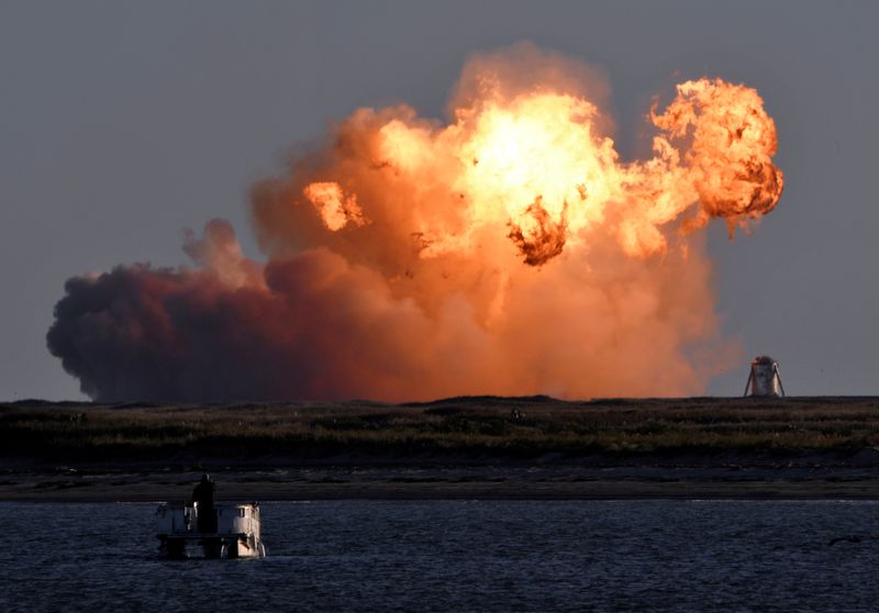 SpaceX's first super heavy-lift Starship SN8 rocket explodes during a return-landing attempt after it launched from their facility on a test flight in Boca Chica, Texas U.S. December 9, 2020. REUTERS/Gene Blevins