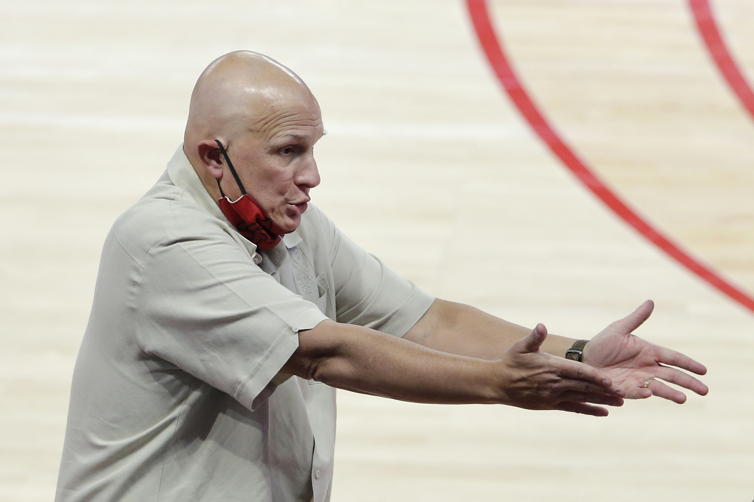 The Latest: Washington-Oregon football game canceled