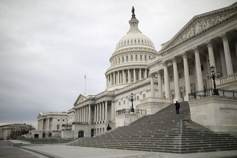 FILE PHOTO: The U.S. Capitol Building following a rainstorm on Capitol Hill in Washington, U.S., December 4, 2020. REUTERS/Tom Brenner/File Photo