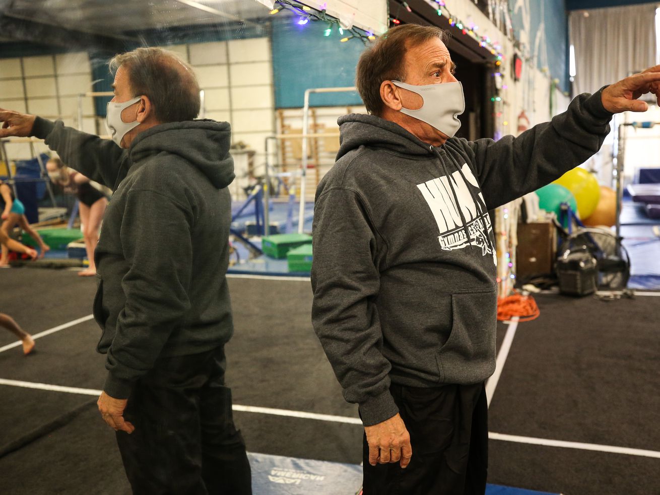 Paul Hunt, owner and instructor of Hunt’s Gymnastics
Academy, instructs his students in Midvale on Friday, Dec. 11,
2020. Due to lost revenue from the coronavirus pandemic, the gym
will close at the end of the month.