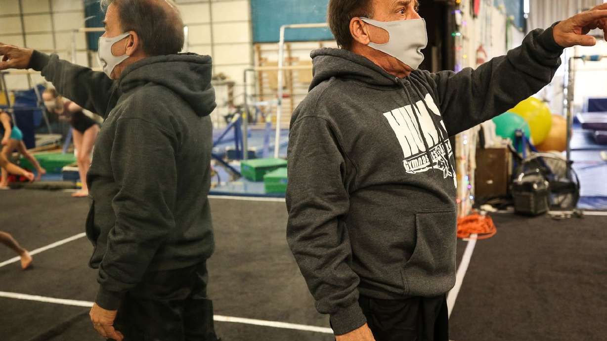 Paul Hunt, owner and instructor of Hunt’s Gymnastics
Academy, instructs his students in Midvale on Friday, Dec. 11,
2020. Due to lost revenue from the coronavirus pandemic, the gym
will close at the end of the month.