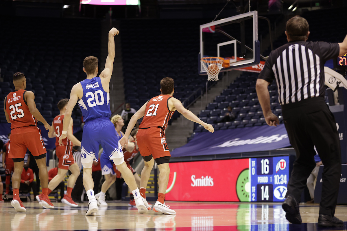 BYU's Spencer Johnson hits a 3-pointer against Utah, Saturday, Dec. 12, 2020 in the Marriott Center in Provo.
