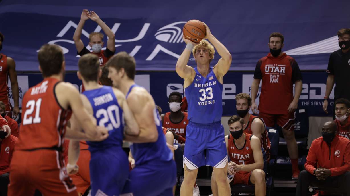 BYU's Caleb Lohner hits a 3-pointer against Utah, Saturday, Dec. 12, 2020 in the Marriott Center in Provo.