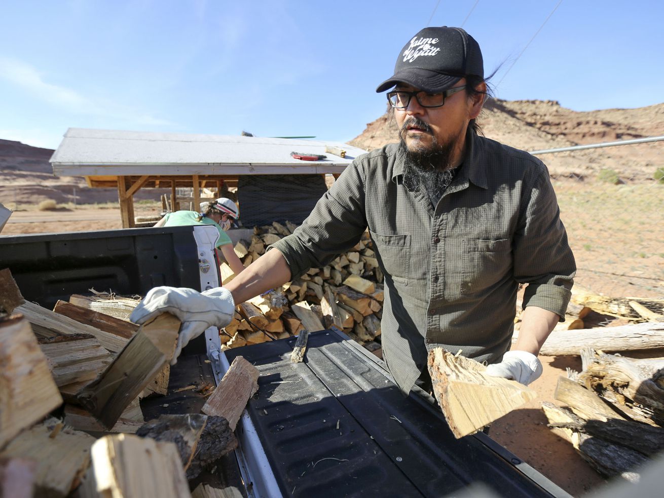 Pete Sands, Utah Navajo COVID-19 Relief program project
manager, delivers wood to an elder in Oljato-Monument Valley, San
Juan County, on Wednesday, April 29, 2020. The Navajo Nation
has one of the highest per capita COVID-19 infection rates in the
country.