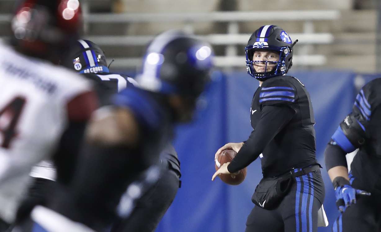 BYU quarterback Zach Wilson (1) looks to throw the ball in the first half of an NCAA college football game against San Diego State Saturday, Dec. 12, 2020, in Provo.
