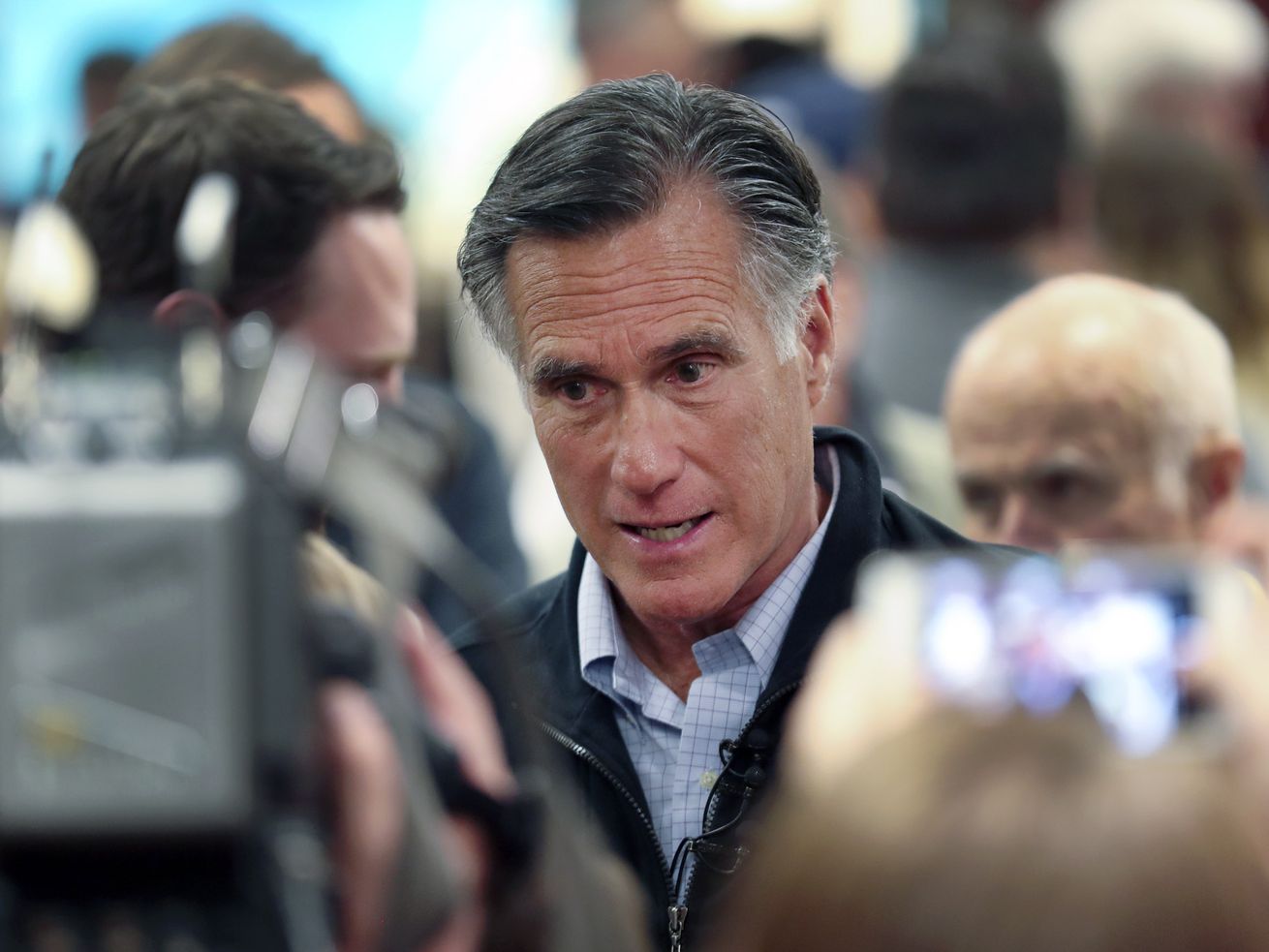 Sen. Mitt Romney, R-Utah, speaks with audience members
following a town hall meeting in Farmington on Tuesday, Jan. 22,
2019.