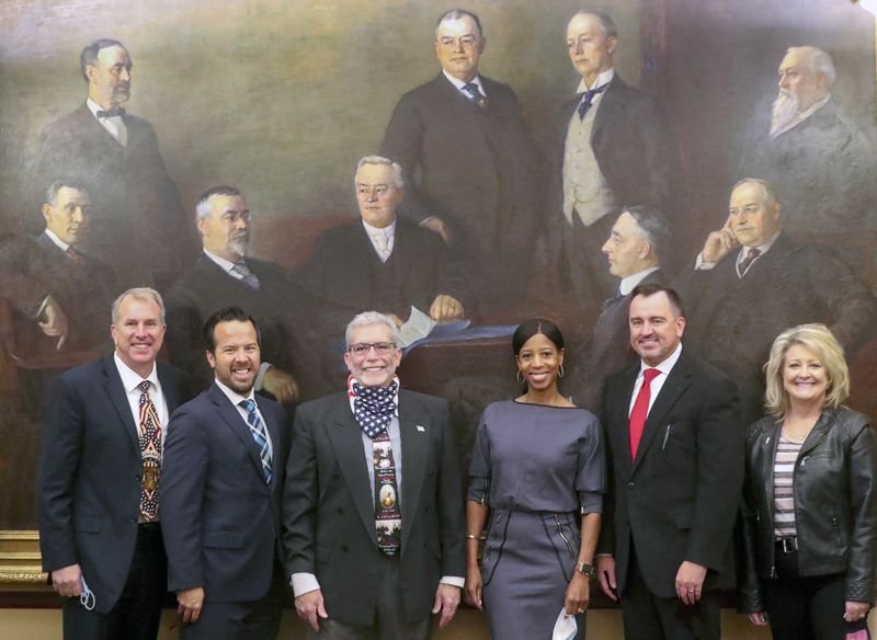 Utah’s designated electors Chris Herrod, Trent Christensen, who ran for Congress in the 4th District, Washington County GOP Chairman Jimi Kestin, former Utah Rep. Mia Love, former Utah House Speaker Greg Hughes, and former Box Elder County Commission candidate Kris Udy pose for a photo after they cast their ballots in the board room at the Capitol in Salt Lake City on Monday, Dec. 14, 2020.