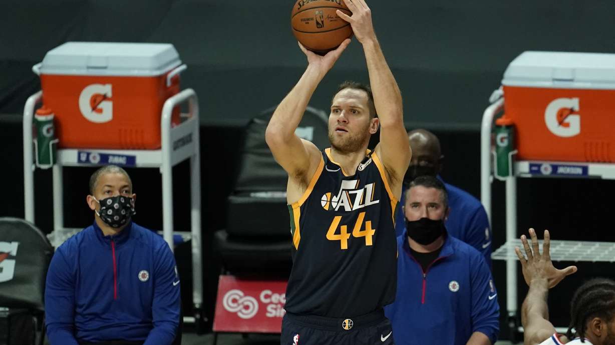 Utah Jazz forward Bojan Bogdanovic (44) shoots Los Angeles Clippers during the first half of an NBA preseason basketball game Thursday, Dec. 17, 2020, in Los Angeles. (AP Photo/Marcio Jose Sanchez)