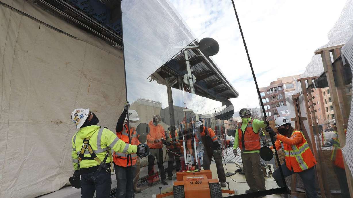 Animated slider doors are installed at 95 State at City
Creek in Salt Lake City on Wednesday, Nov. 25, 2020. The
515,000-square-foot 25-story Class A office tower will feature
cutting-edge technology incorporating state-of-the-art enhancements
that allows touchless entry from the main door and throughout the
property, thereby creating a safer and healthier workplace
experience for tenants and visitors.
