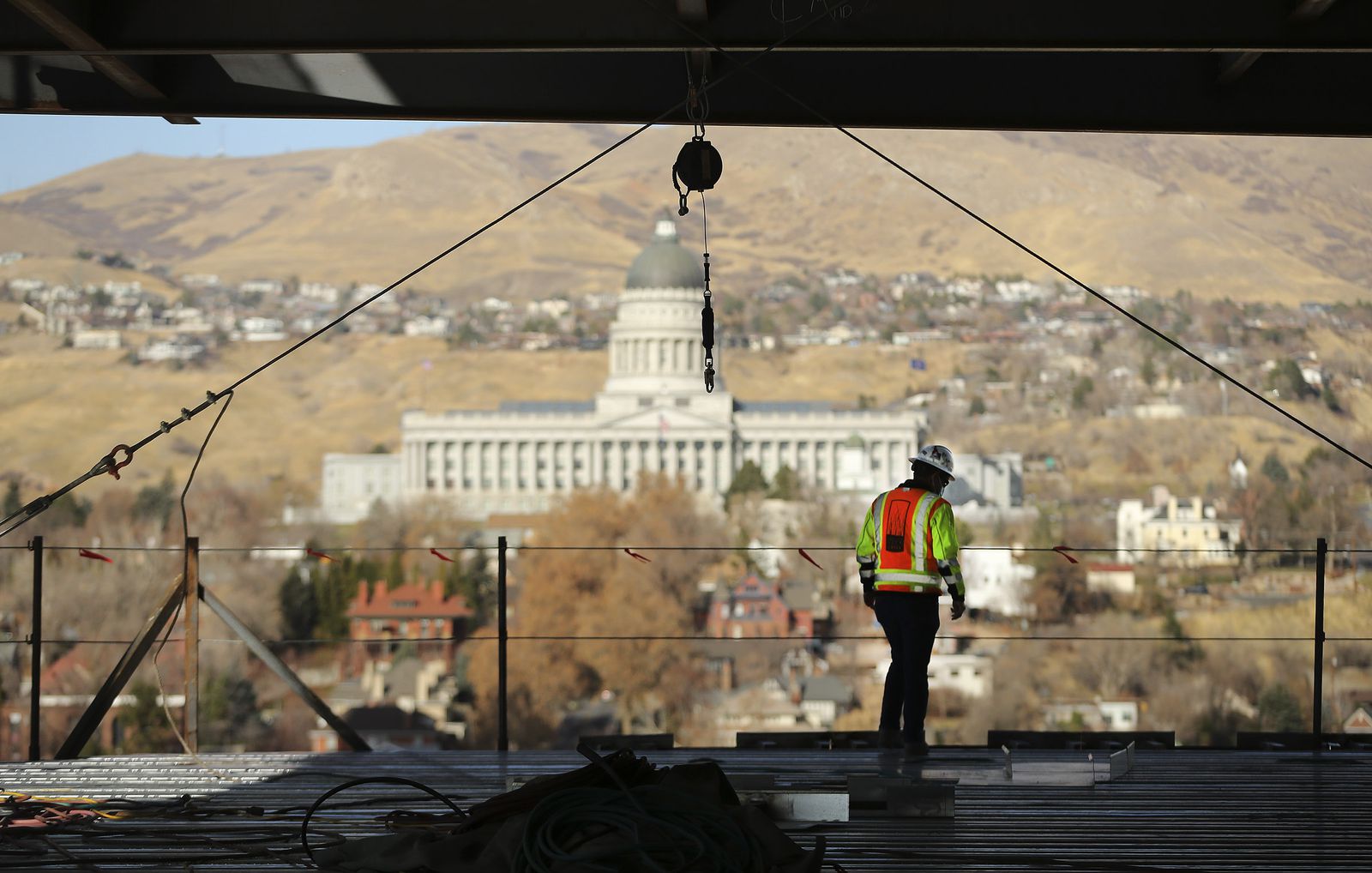 Sean Tuite, director of construction for City Creek Reserve, looks over the progress on 95 State at City Creek in Salt Lake City on Wednesday, Nov. 25, 2020. The 515,000-square-foot 25-story Class A office tower will feature cutting-edge technology incorporating state-of-the-art enhancements that allows touchless entry from the main door and throughout the property, thereby creating a safer and healthier workplace experience for tenants and visitors.
