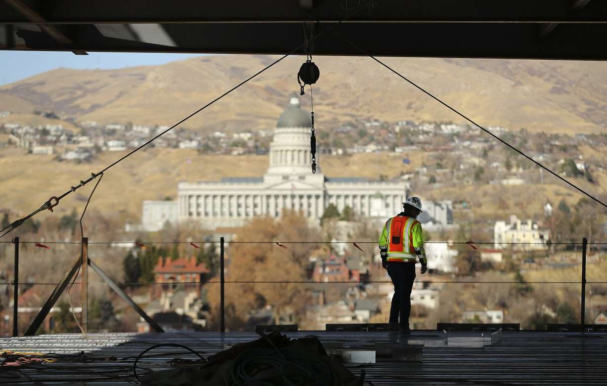 Sean Tuite, director of construction for City Creek Reserve, looks over the progress on 95 State at City Creek in Salt Lake City on Wednesday, Nov. 25, 2020. The 515,000-square-foot 25-story Class A office tower will feature cutting-edge technology incorporating state-of-the-art enhancements that allows touchless entry from the main door and throughout the property, thereby creating a safer and healthier workplace experience for tenants and visitors.