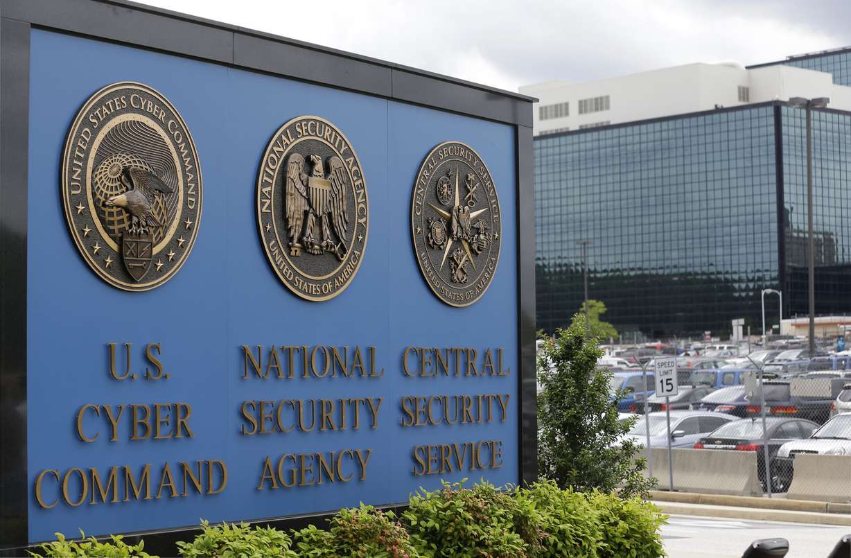 FILE - This June 6, 2013 file photo, shows the sign outside the National Security Agency (NSA) campus in Fort Meade, Md.All fingers are pointing to Russia as author of the worst-ever hack of U.S. government agencies. But President Donald Trump, long wary of blaming Moscow for cyberattacks has so far been silent.