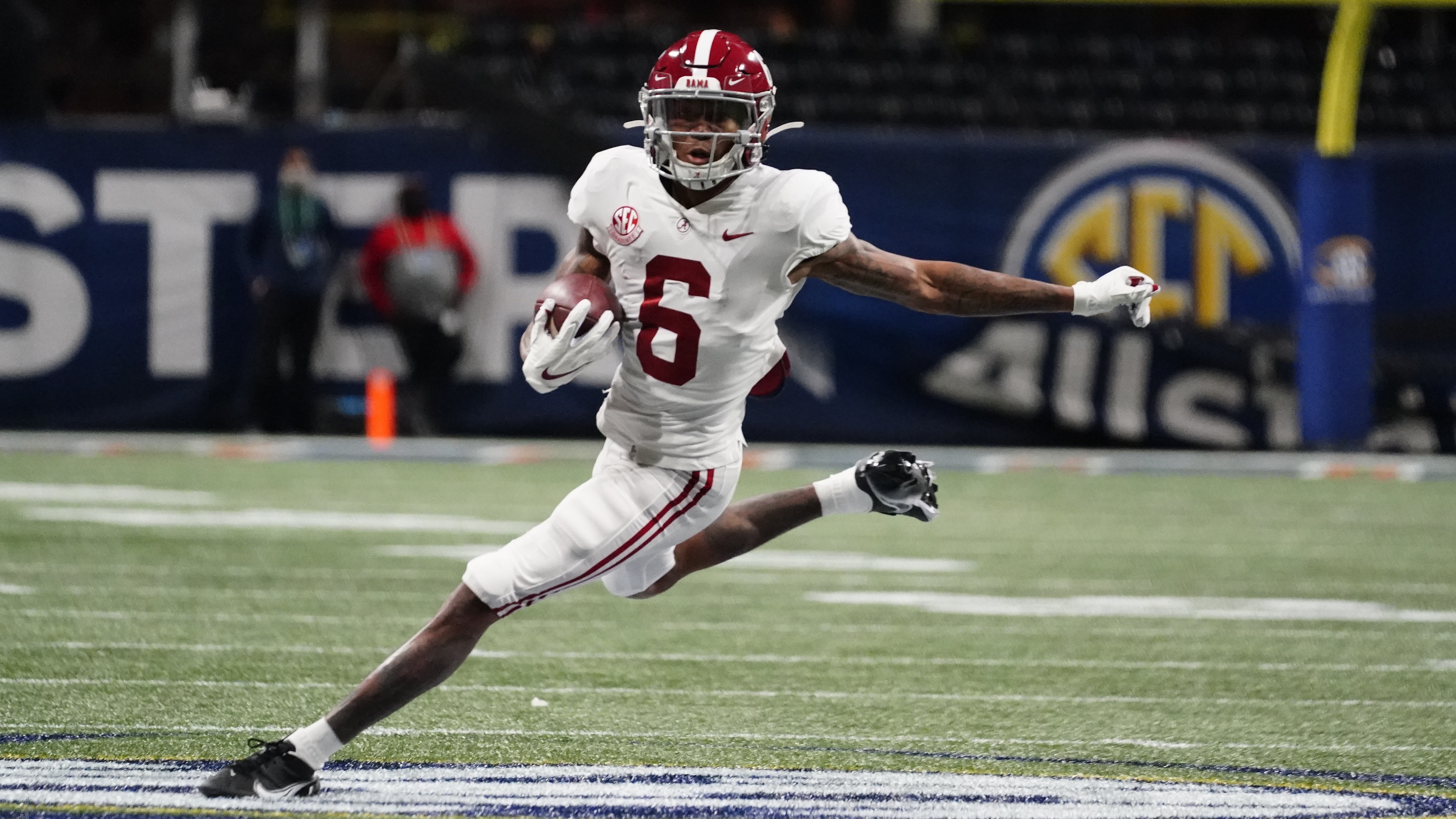 Alabama wide receiver DeVonta Smith (6) runs against Florida during the first half of the Southeastern Conference championship NCAA college football game, Saturday, Dec. 19, 2020, in Atlanta. (AP Photo/Brynn Anderson) [Dec-19-2020]