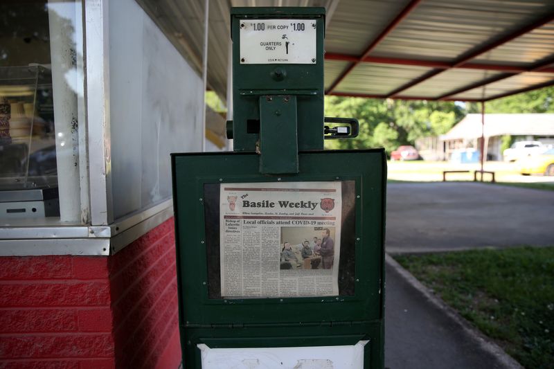 FILE PHOTO: A newspaper vending machine is pictured in Basile amid a coronavirus disease (COVID-19) outbreak across the state of Louisiana, U.S., March 26, 2020.  REUTERS/Jonathan Bachman