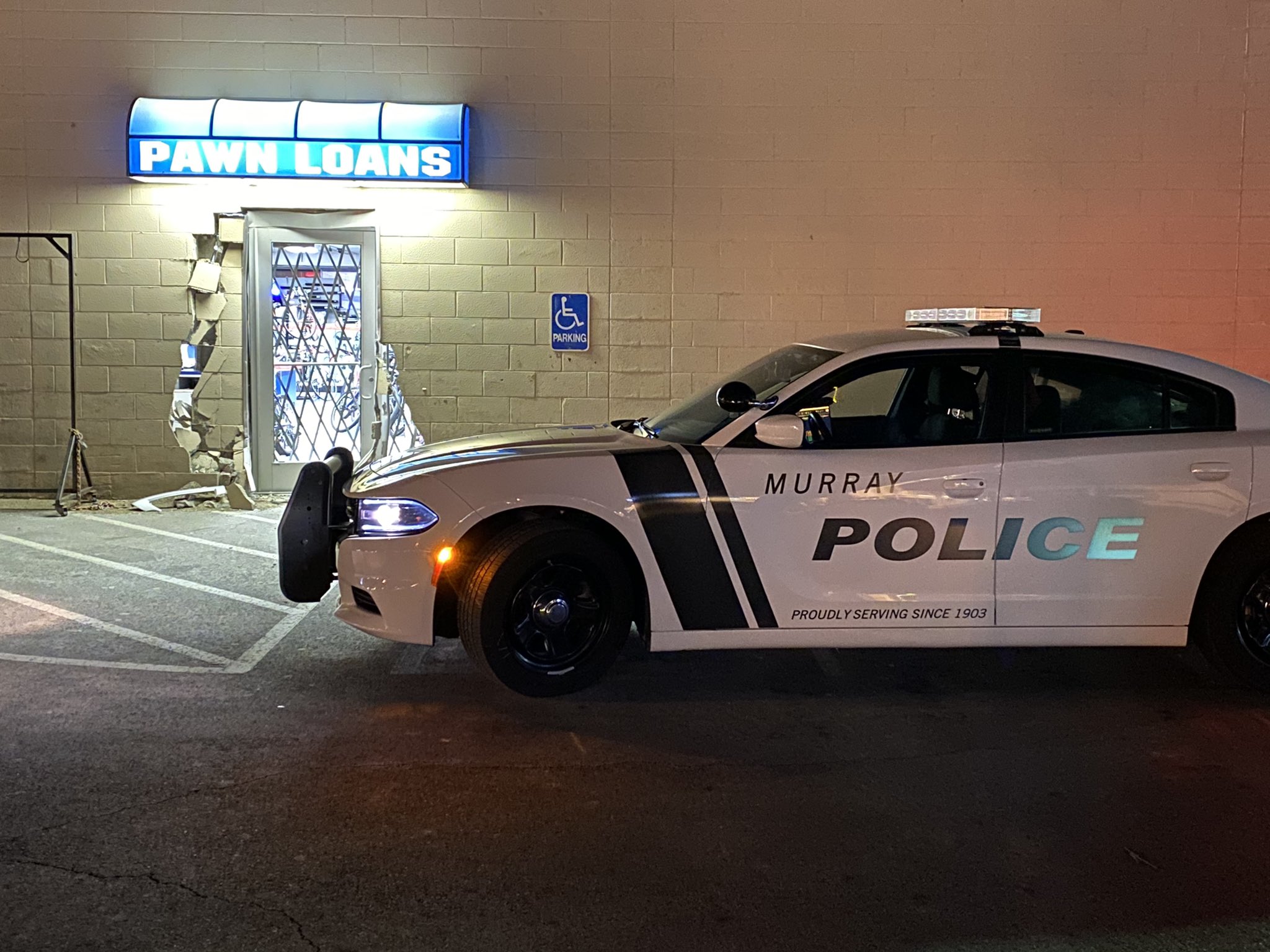 A car rammed into EZ Pawn in Murray Tuesday, Dec. 22, 2020, police say.