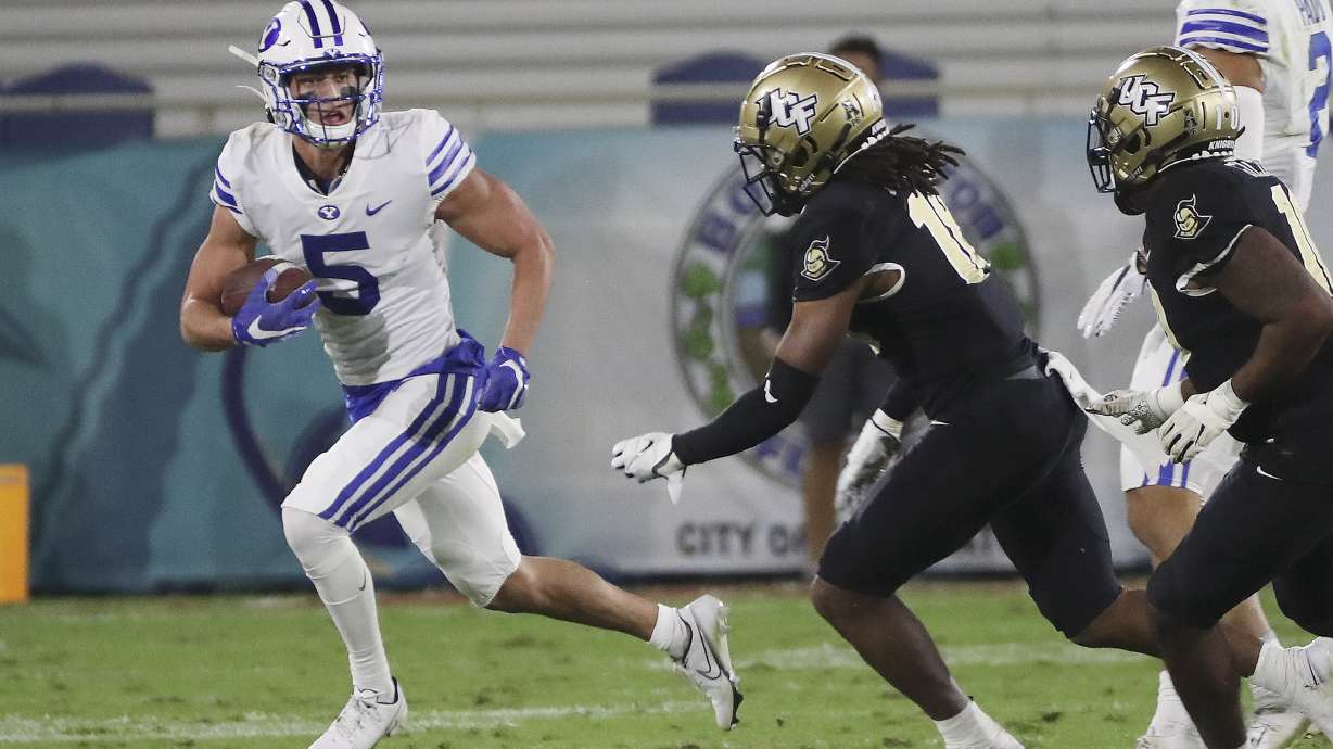 Brigham Young Cougars wide receiver Dax Milne (5) runs for a gain during the Boca Raton Bowl in Boca Raton, Fla., on Tuesday, Dec. 22, 2020.