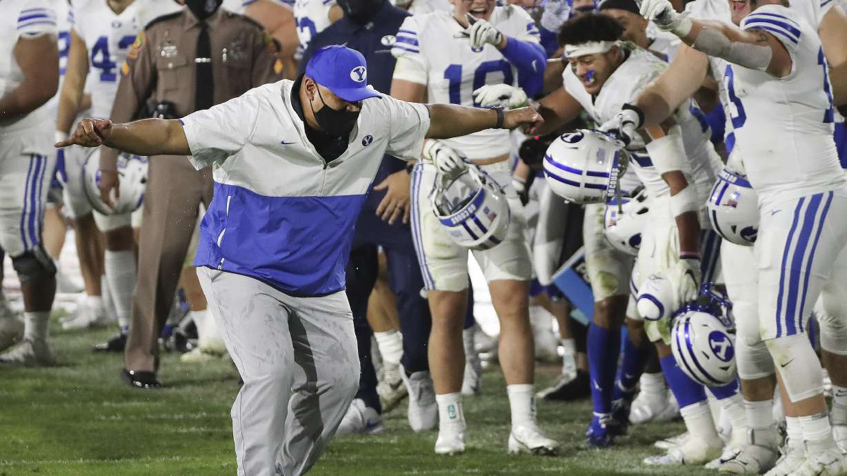 Brigham Young Cougars head coach Kalani Sitake celebrates the win over the UCF Knights during the Boca Raton Bowl in Boca Raton, Fla., on Tuesday, Dec. 22, 2020. BYU won 49-23.