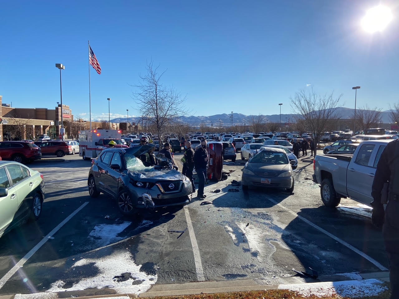 4 cars involved in rollover crash in South Jordan Harmons parking lot