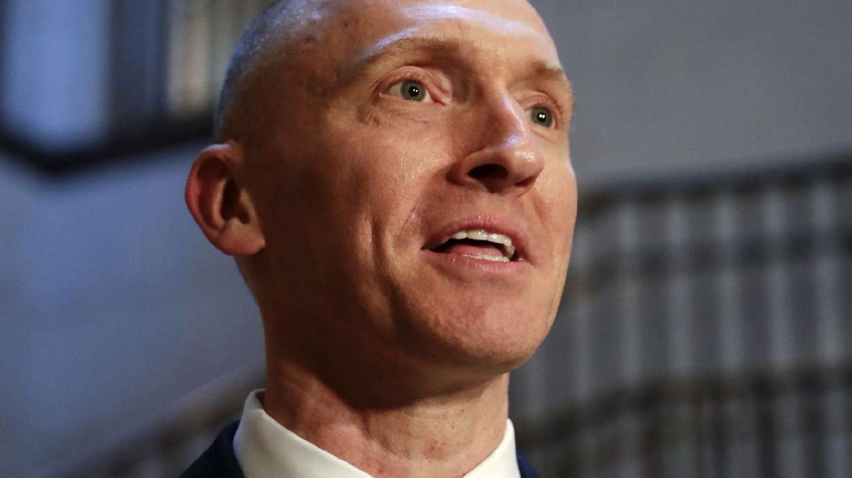 Carter Page, a foreign policy adviser to Donald Trump’s
2016 presidential campaign, speaks with reporters following a day
of questions from the House Intelligence Committee, on Capitol Hill
in Washington on Nov. 2, 2017. Page, who was the target of a secret
surveillance warrant during the FBI’s Russia investigation says in
a federal lawsuit filed Friday, Nov. 27, 2020, that he was the
victim of "unlawful spying.” The suit from Carter Page alleges a
series of omissions and errors made by FBI and Justice Department
officials in applications they submitted to the Foreign
Intelligence Surveillance Court to eavesdrop on Page on suspicion
that he was an agent of Russia.