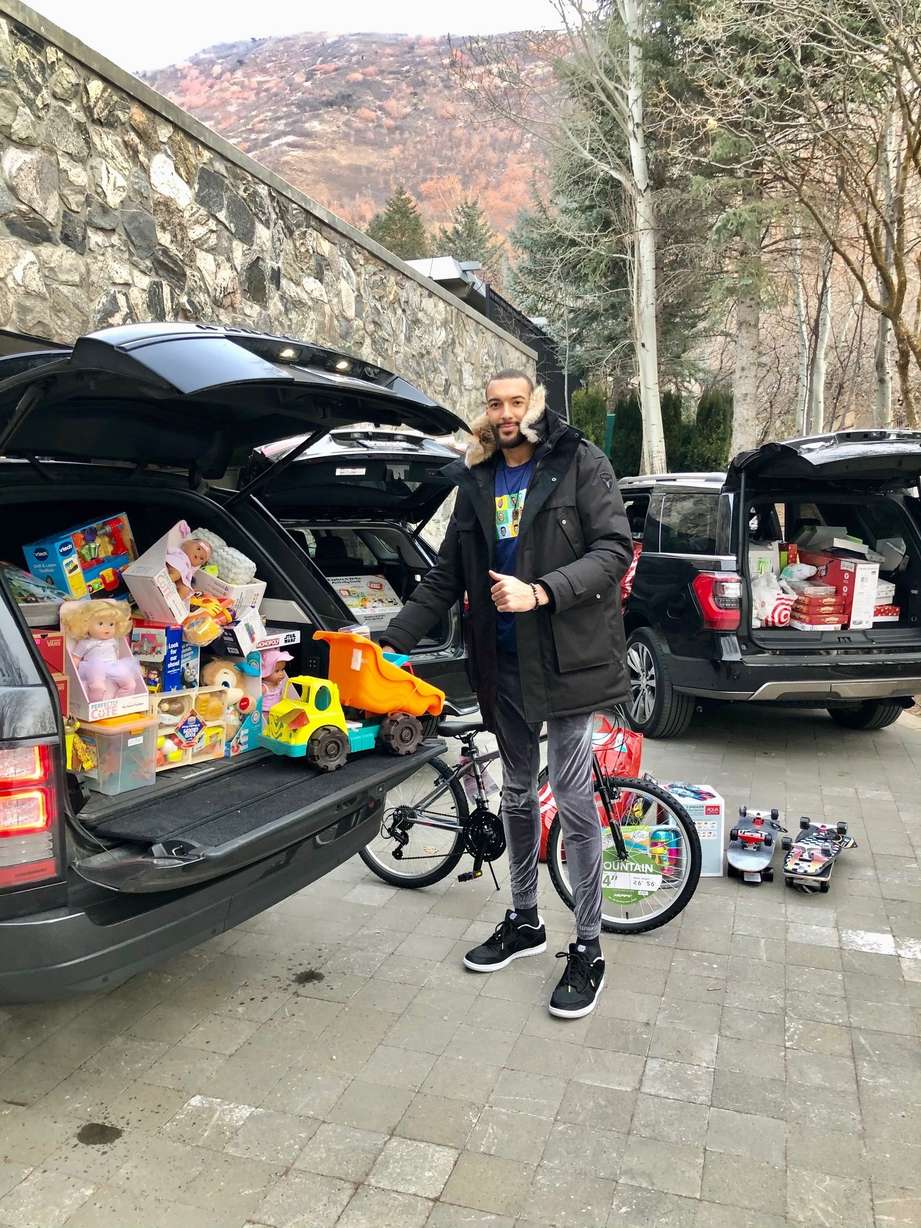 Rudy Gobert delivered three car loads of clothes and toys to Utah Community Action.