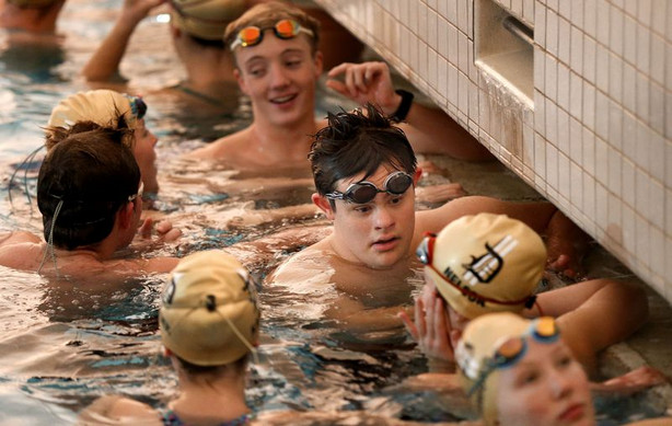Lance Gillespie chats with his Davis High School
teammates during practice in Layton on Friday, Dec. 4, 2020.
Gillespie is captain of the varsity swim team.