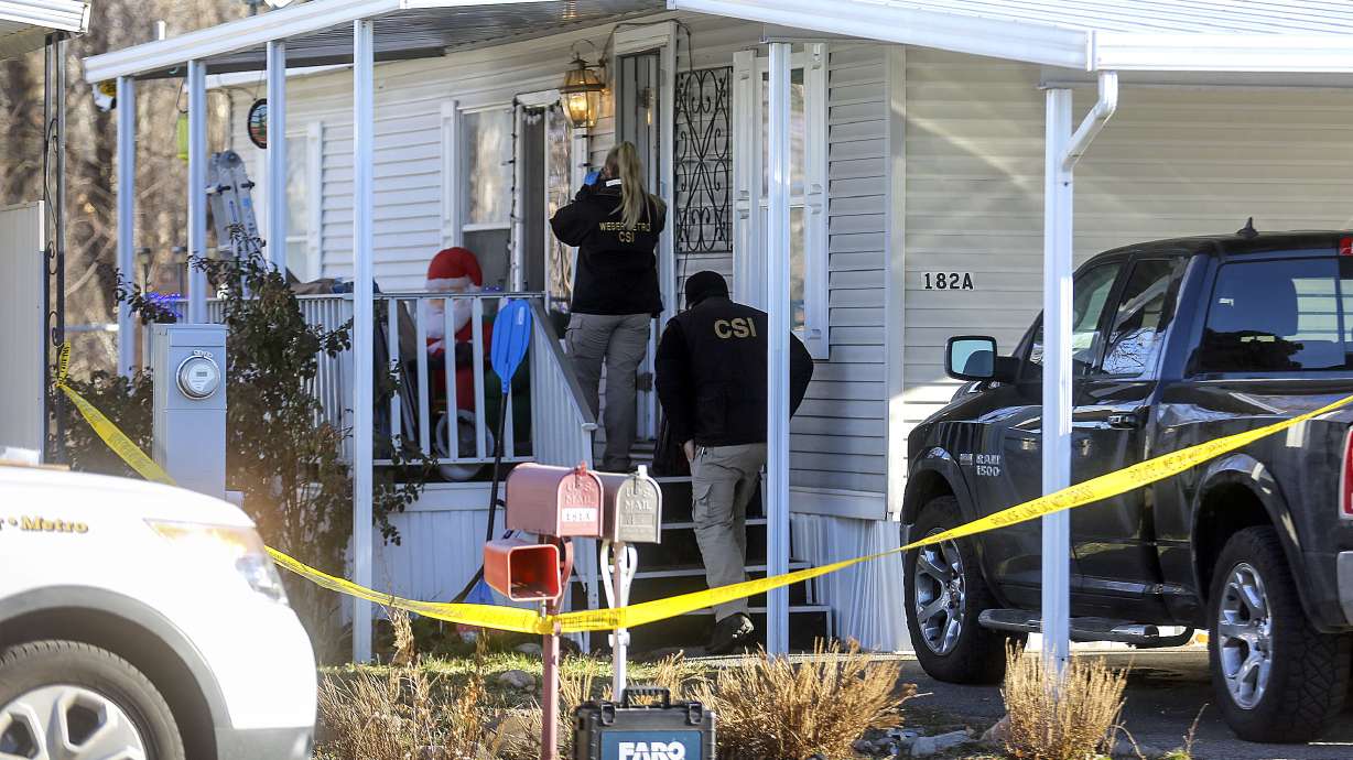 Weber Metro CSI unit members work at the scene of a fatal shooting that occurred early Christmas morning in Riverdale, Weber County, on Friday, Dec. 25, 2020.