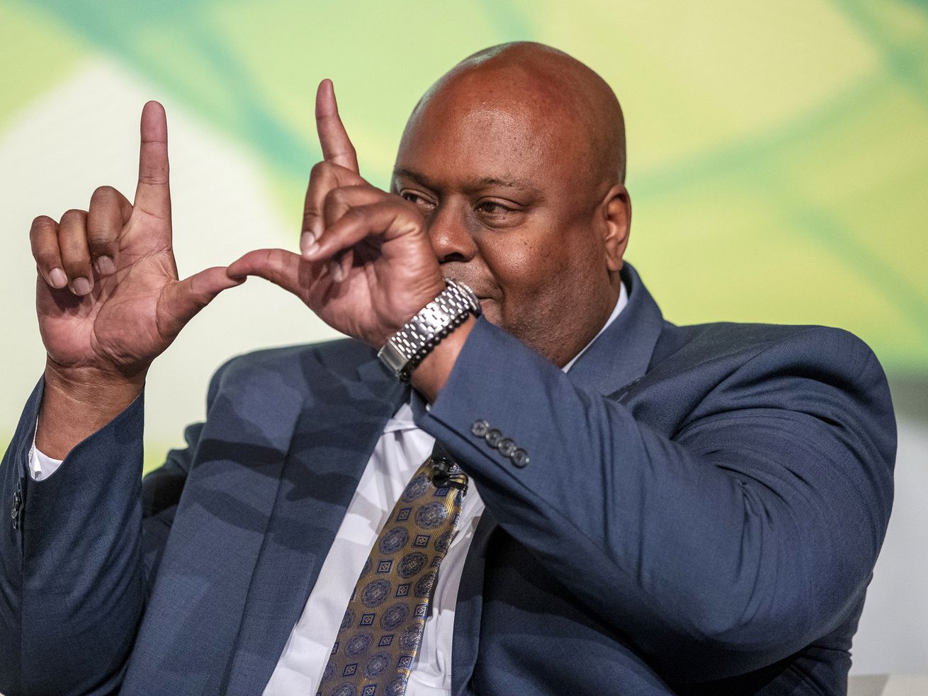 Former University of Utah and Chicago Bears football
player Shawn Newell, vice president of business development at
Industrial Supply Co., flashes a block U at the 13th Utah Economic
Summit at the Grand America Hotel in Salt Lake City on Friday, May
17, 2019.