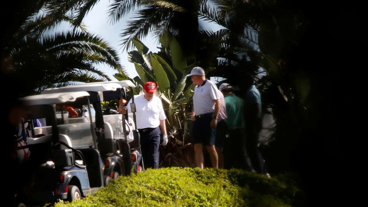 U.S. President Donald Trump plays golf at the Trump International Golf Club in West Palm Beach, Florida, U.S., December 27, 2020.
