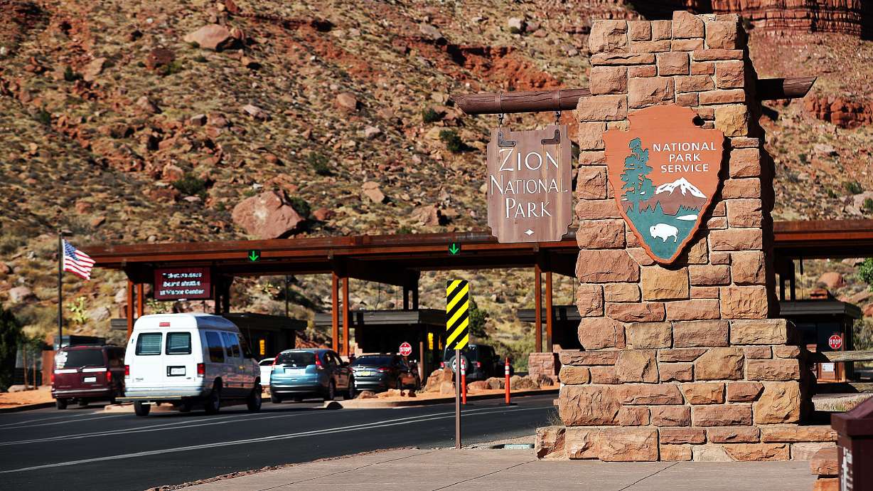 Vehicles enter Zion National Park on Wednesday, Oct. 14, 2020. The park continues to experience high visitation that began in late 2020.