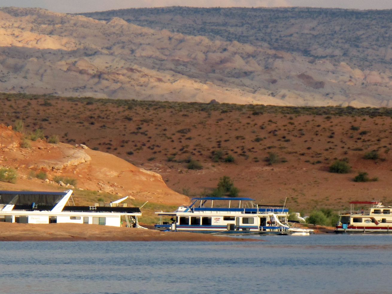 Houseboats are parked on the shores of Lake Powell in
this file photo.