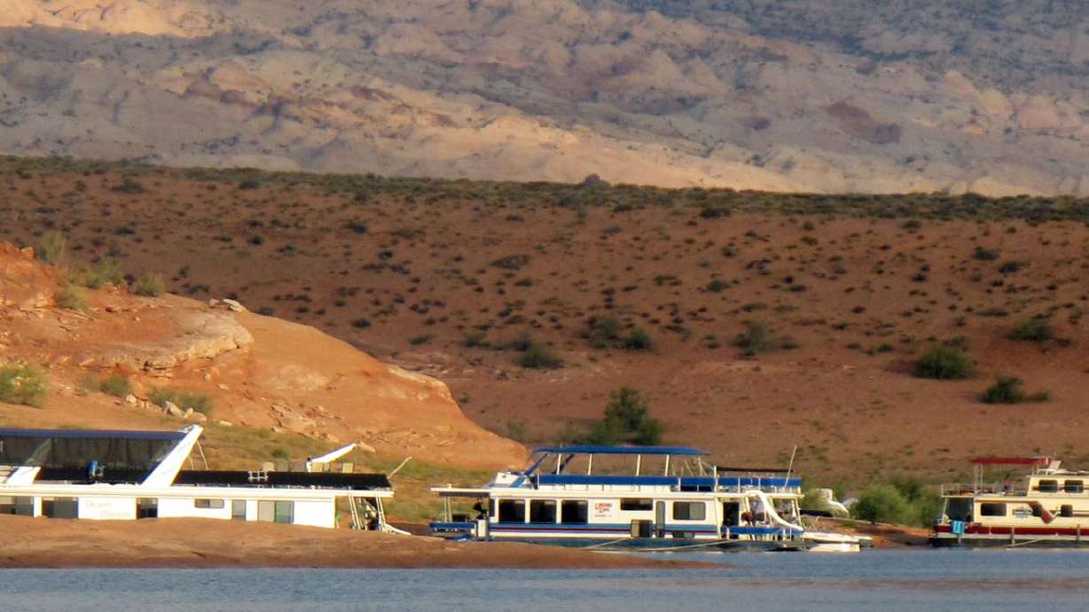 Houseboats are parked on the shores of Lake Powell in
this file photo.