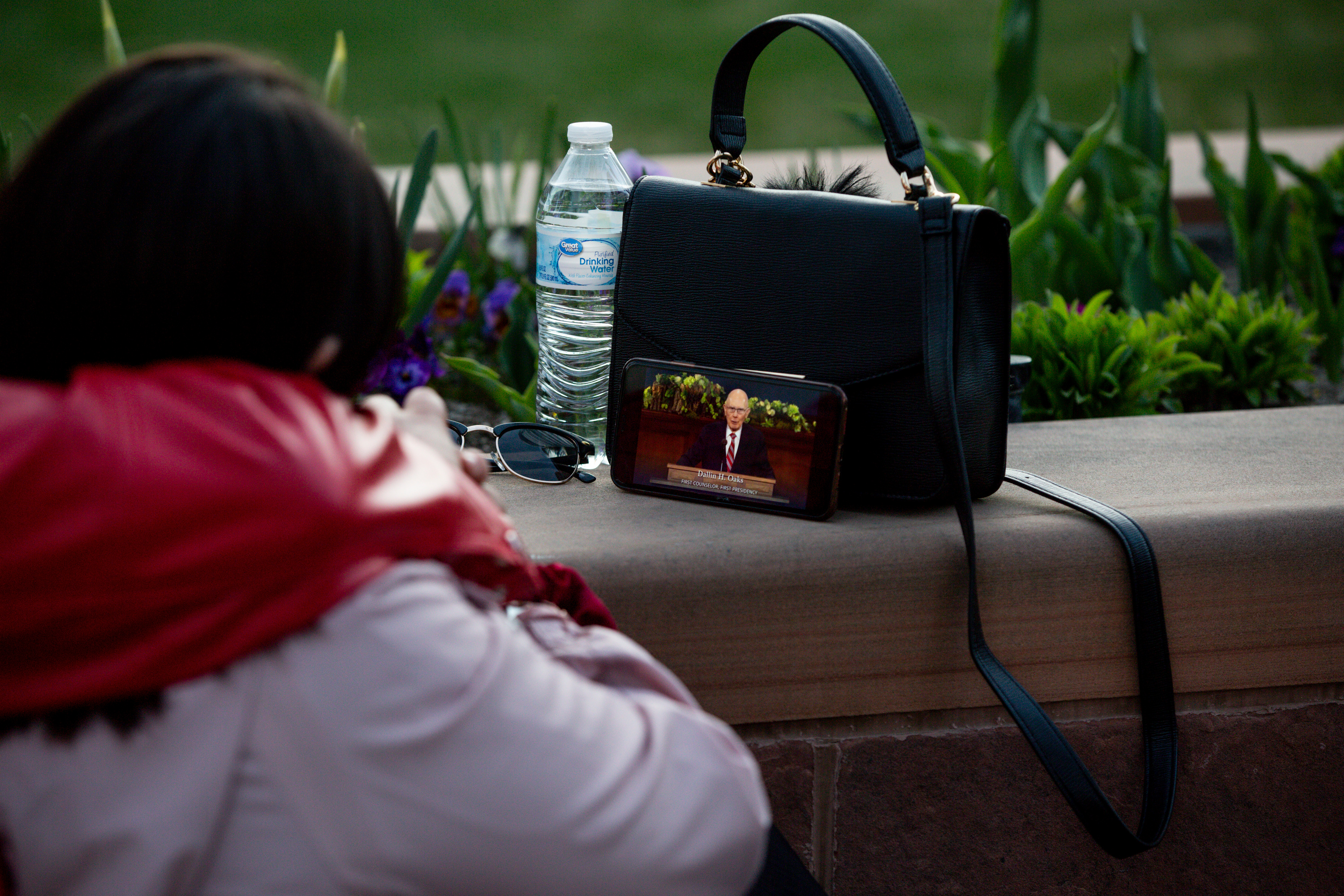 Mahonri J. Sanchez, of Orem, and Nancy Chairez, of Provo, watch the evening session of the 190th Annual General Conference of The Church of Jesus Christ of Latter-day Saints at Temple Square in Salt Lake City on Saturday, April 4, 2020. Sanchez planned to take Chairez to the Conference Center to attend conference together this year but had to cancel their plans due to the COVID-19 pandemic.
