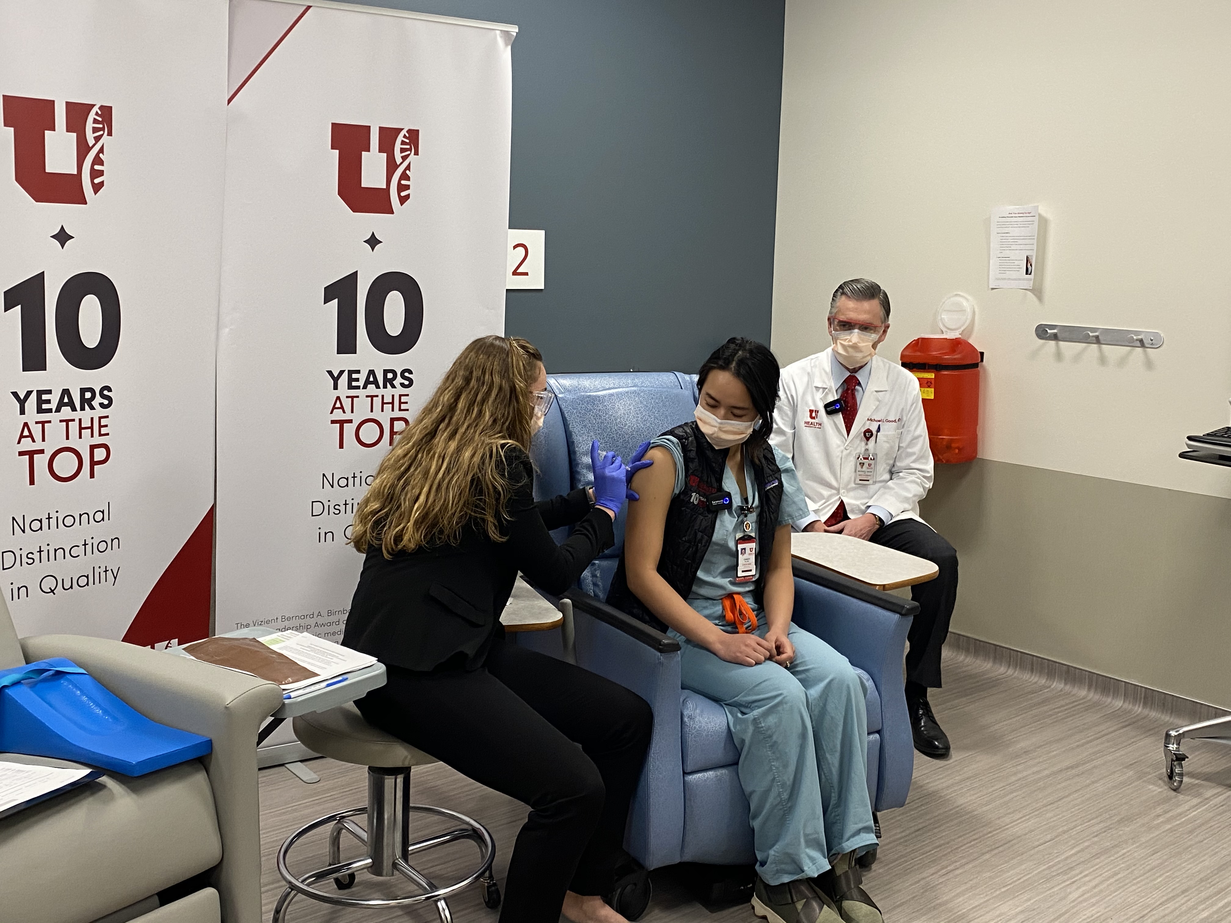 Christy Mulder, middle, a University of Utah Health intensive care unit nurse, was the first person to receive the COVID-19 vaccine in Utah on Tuesday, December 15, 2020.