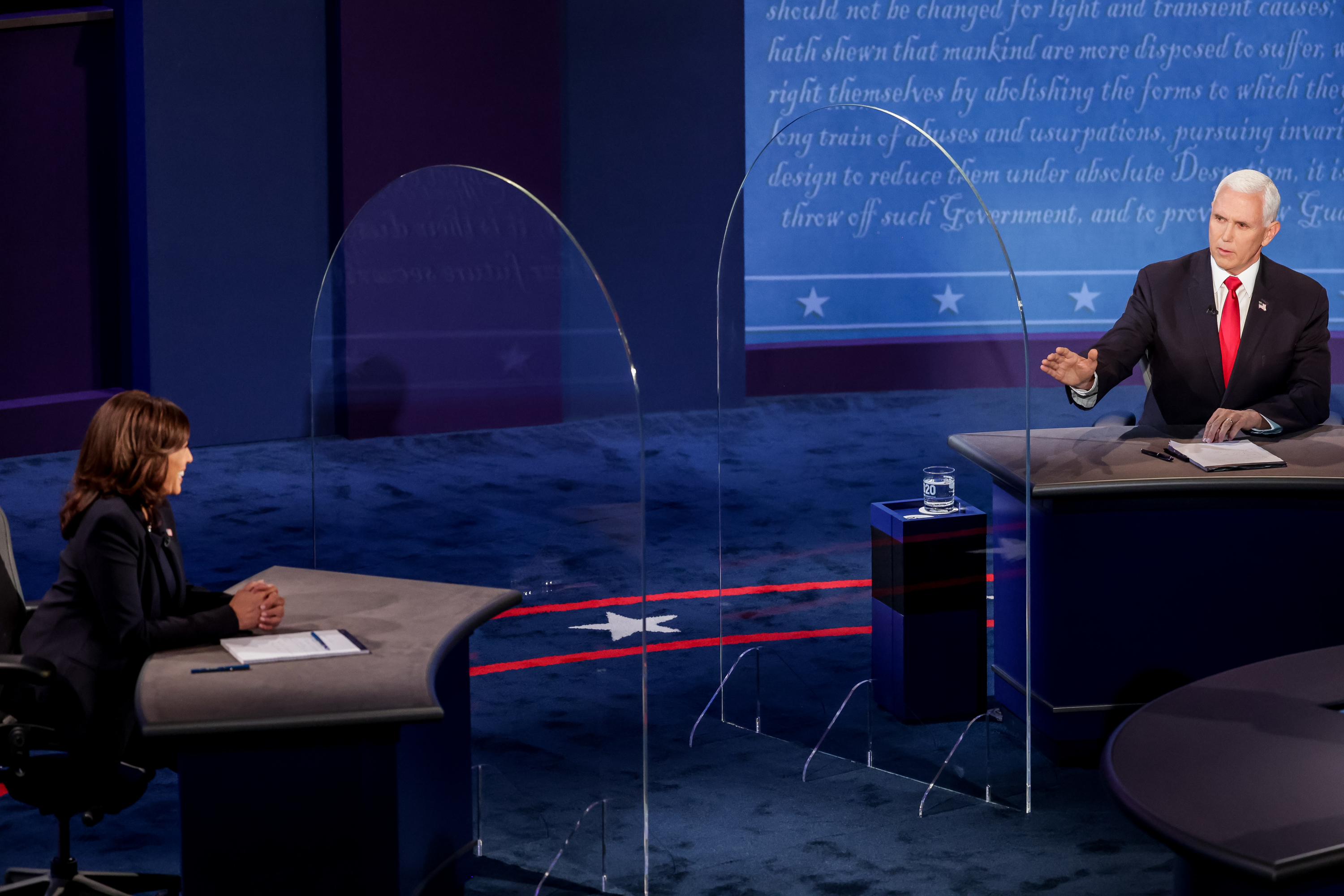 Democratic vice presidential candidate California Sen. Kamala Harris and Vice President Mike Pence take part in the vice presidential debate at Kingsbury Hall at the University of Utah in Salt Lake City on Wednesday, Oct. 7, 2020.