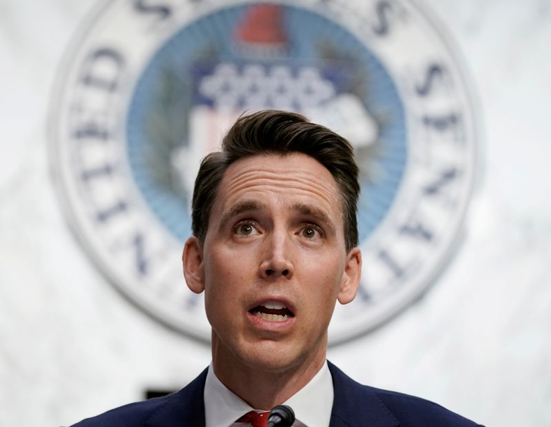 FILE PHOTO: U.S. Senator Josh Hawley (R-MO) speaks during the third day of the confirmation hearing for Supreme Court nominee Judge Amy Coney Barrett before the Senate Judiciary Committee on Capitol Hill in Washington, DC, U.S., October 14, 2020.   Ken Cedeno/Pool via REUTERS/File Photo